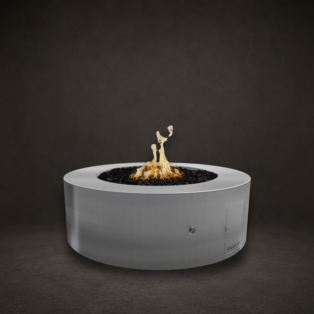 Unity Fire Pit in Stainless Steel with lit flame, studio composite